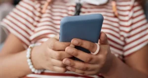 A child holding a smartphone