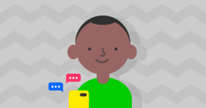 A young boys uses a smartphone with chatting icons.