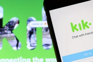 A smartphone with the Kik app logo.